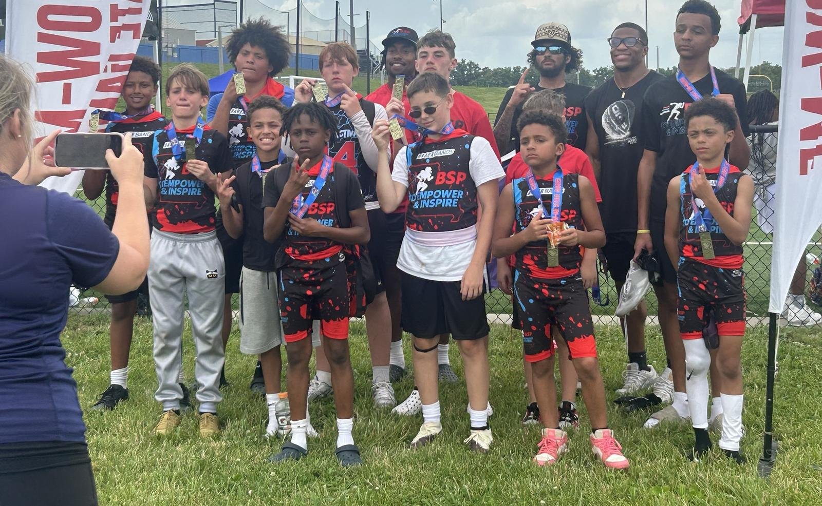 BSP 7v7 athletes and coaches holding up their medals at the Show-Me State Games